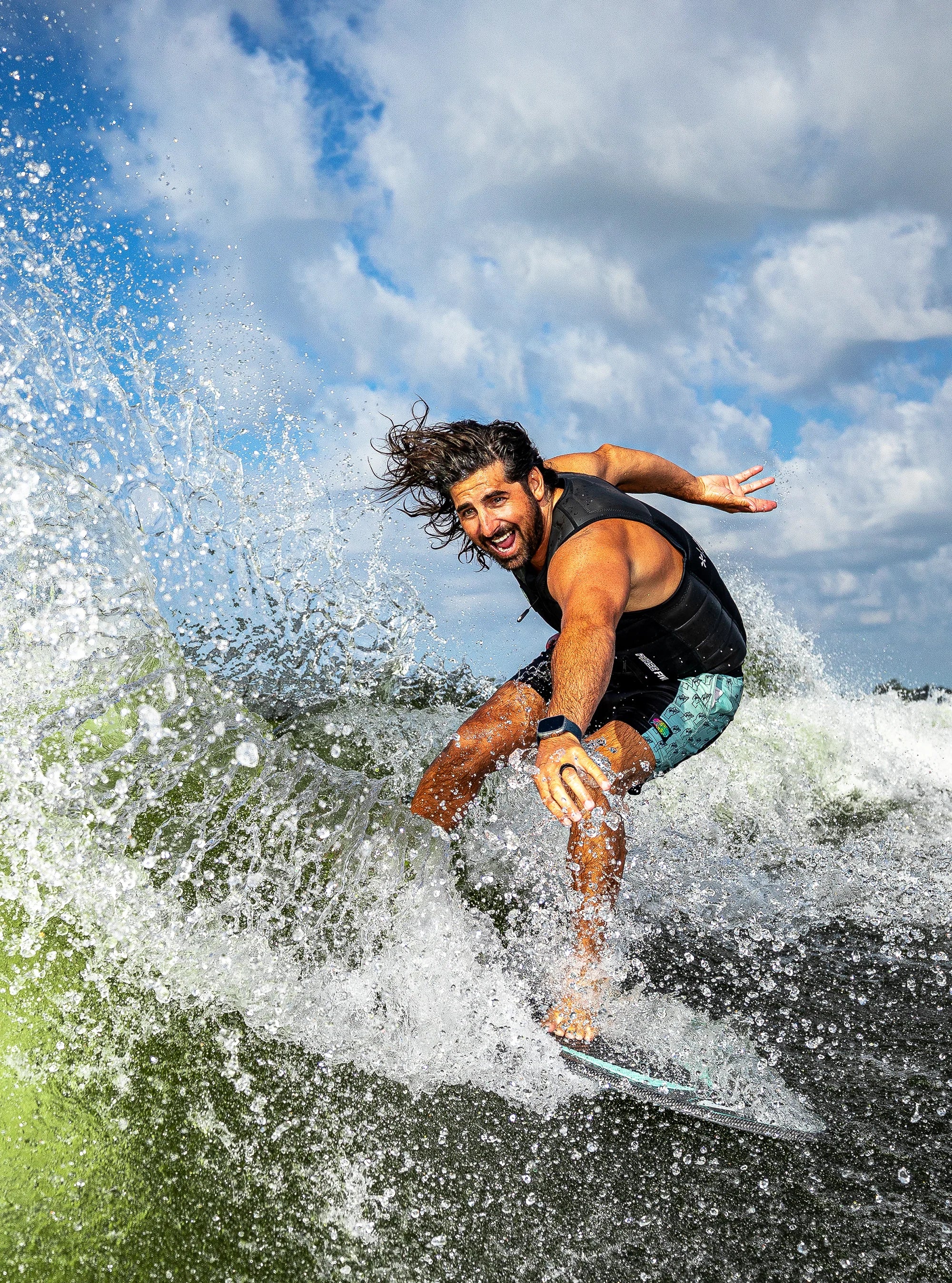 Phase 5 Key Wake Surf Board on lake waves